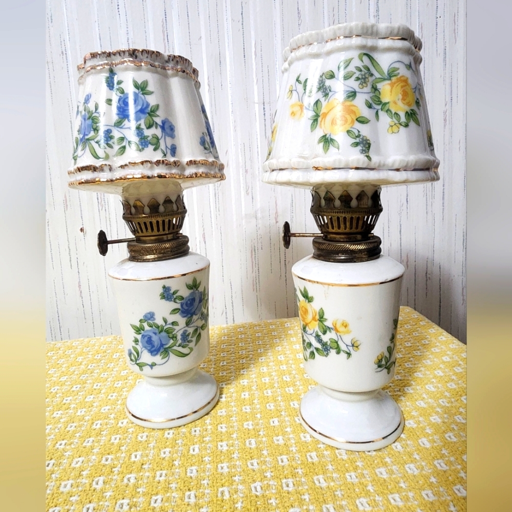 2 small oil lamps. Approx 8 inches in height